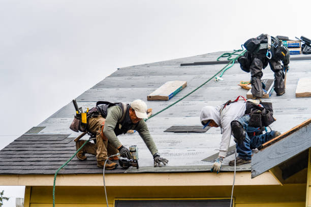Professional Gutter Installation technician working in Wilkeson, WA